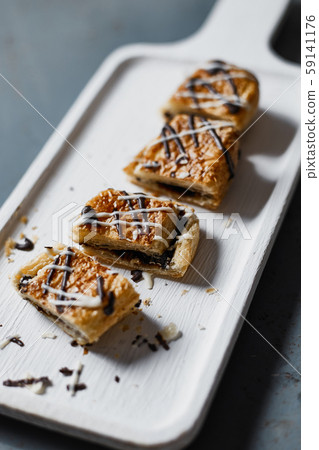 Chocolate cream danish on background. . Chocolate cream danish on background. . 59141176
