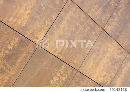 Diagonal view at beige-brown uneven coloured tile on wall, for architecture design Diagonal view at beige-brown uneven coloured tile on wall, for architecture design 59142188