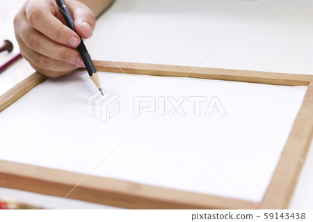 Hand little girl holding Pencil drawing paper on background. Hand little girl holding Pencil drawing paper on background. 59143438