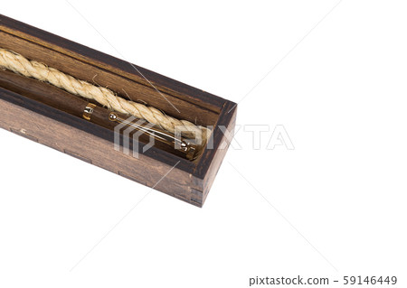 Beautiful wooden box with ballpoint pen inside on 59146449