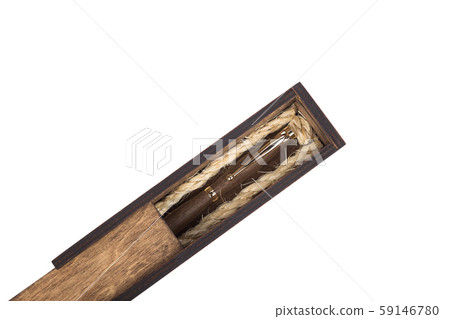 Beautiful wooden box with ballpoint pen inside on 59146780