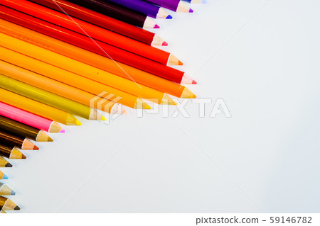 Line of color pencils isolated on white background. Close up. Copy Space. 59146782