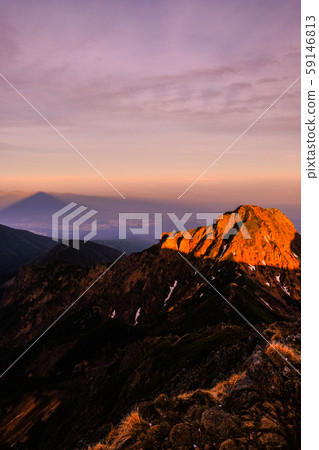Yatsugatake mountain climbing in spring: Dawn at the summit of Mt. Akadake (Mt. Amida and Kage Amida) 59146813