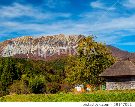 Autumn Daisen thatched roof and Daisen Autumn Daisen thatched roof and Daisen 59147091