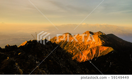 Spring Yatsugatake mountain climbing: Dawn at the summit of Mt. Akadake 59149449