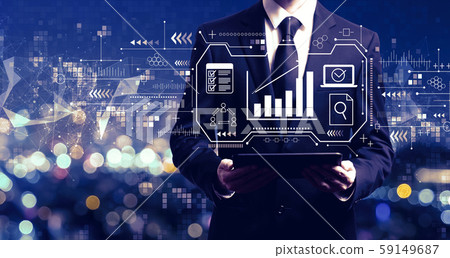Marketing concept with businessman holding a tablet Marketing concept with businessman holding a tablet 59149687