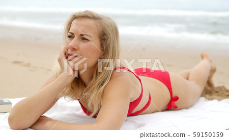 A relaxing day on a sandy beach at the ocean 59150159