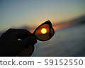 Sunset over sunglasses 59152550