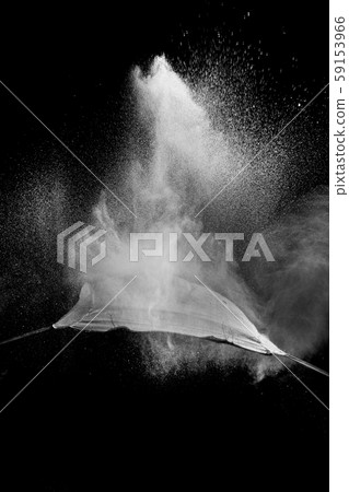 Freeze motion of white dust particles splash on black background.White powder explosion clouds. Freeze motion of white dust particles splash on black background.White powder explosion clouds. 59153966