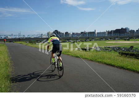 Cycling scenery of Tama River in autumn Cycling scenery of Tama River in autumn 59160370