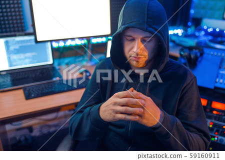 Hacker in mask and hood, illegal lifestyle Hacker in mask and hood, illegal lifestyle 59160911