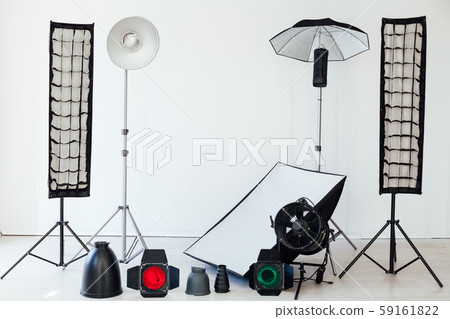Photo studio equipment flash accessories photographer on a white background 59161822