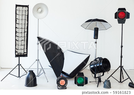Photo studio equipment flash accessories photographer on a white background Photo studio equipment flash accessories photographer on a white background 59161823