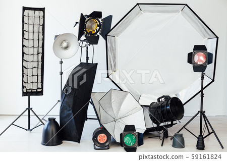 Photo studio equipment flash accessories photographer on a white background Photo studio equipment flash accessories photographer on a white background 59161824