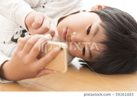 智能手機小學男孩智能手機成癮規則 59161883