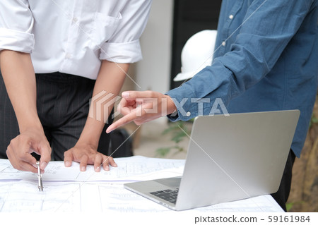 architect engineer working on house blueprint of real estate project. building construction concept. 59161984