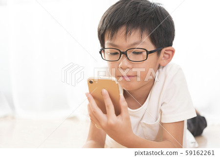 智能手機小學男孩智能手機成癮規則 59162261