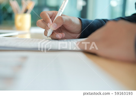 applicant fill out application form. man signing contract agreement. employment recruitment concept applicant fill out application form. man signing contract agreement. employment recruitment concept 59163193