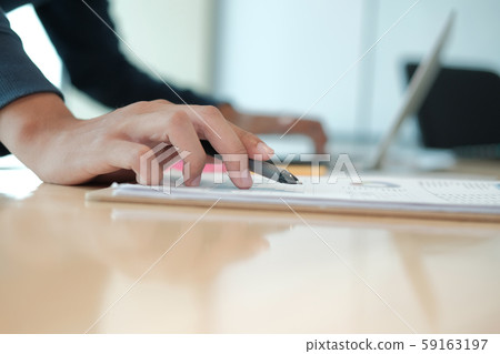 male freelancer working with computer document. startup man analyzing financial performance. student studying doing assignment male freelancer working with computer document. startup man analyzing financial performance. student studying doing assignment 59163197