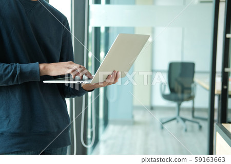 male freelancer working with computer. startup man analyzing data. student studying doing assignment male freelancer working with computer. startup man analyzing data. student studying doing assignment 59163663