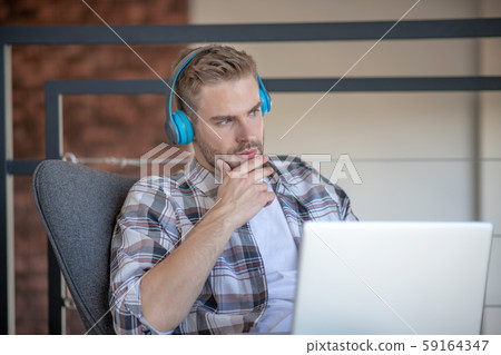 Bearded freelancer feeling thoughtful while starting new project 59164347