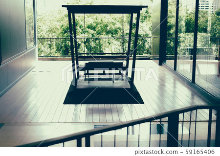 wooden rocking chair bench on terrace patio wooden rocking chair bench on terrace patio 59165406