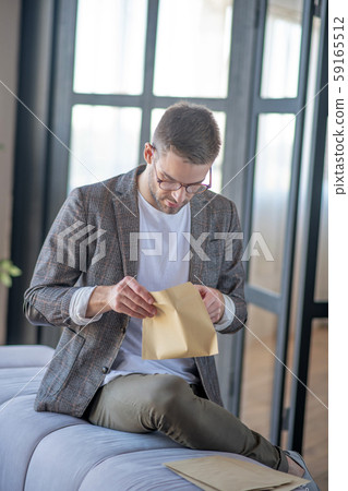 low angle, waist up, sitting, sofa, glass door, dark-haired, glasses, eyewear low angle, waist up, sitting, sofa, glass door, dark-haired, glasses, eyewear 59165512