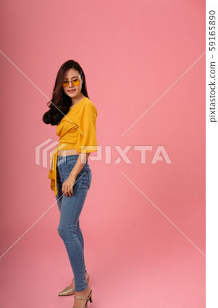 portrait of smiling asian woman in casual clothing. studio shot 59165890