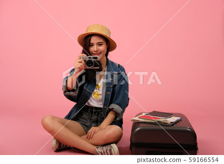 woman backpacker traveler with camera. journey trip travel. studio shot woman backpacker traveler with camera. journey trip travel. studio shot 59166554