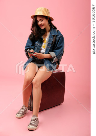 woman backpacker traveler with smartphone passport money. journey trip travel. studio shot woman backpacker traveler with smartphone passport money. journey trip travel. studio shot 59166567