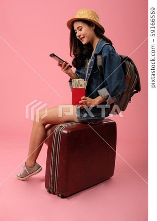 woman backpacker traveler with smartphone passport money. journey trip travel. studio shot woman backpacker traveler with smartphone passport money. journey trip travel. studio shot 59166569
