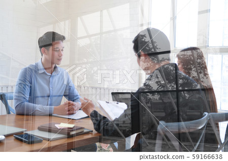 human resource team interviewing candidate for job vacancy. applicant explaining profile for career recruitment human resource team interviewing candidate for job vacancy. applicant explaining profile for career recruitment 59166638