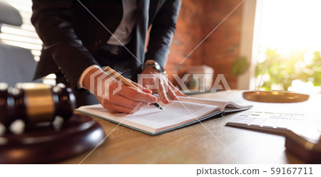 Lawyer working in office. Law and justice concept Lawyer working in office. Law and justice concept 59167711