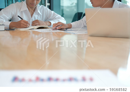 financial adviser analyzing performance revenue 59168582