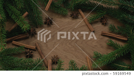 Top view christmas composition with spruce branches and natural decorations Top view christmas composition with spruce branches and natural decorations 59169549