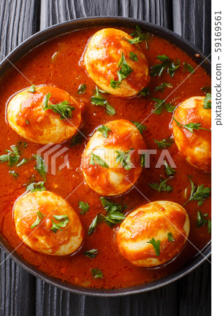Indian traditional food curry eggs in spicy sauce Indian traditional food curry eggs in spicy sauce 59169561