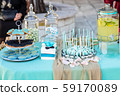 table with cakes for the baptism 59170089