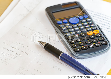 Math problems and pen and calculator 59170816