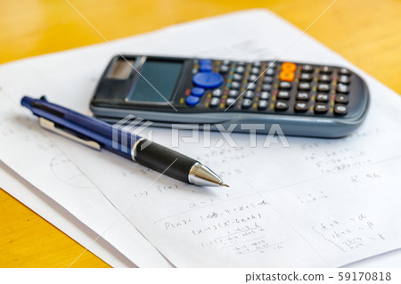 Math problems and pen and calculator 59170818