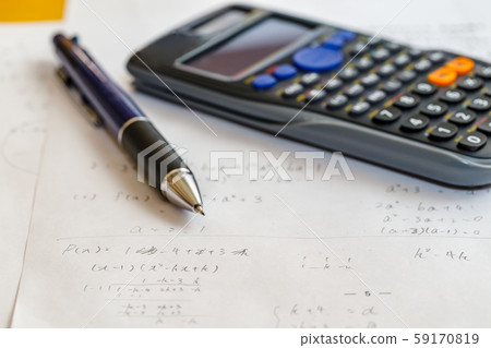 Math problems and pen and calculator Math problems and pen and calculator 59170819