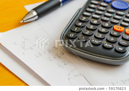 Math problems and pen and calculator Math problems and pen and calculator 59170823