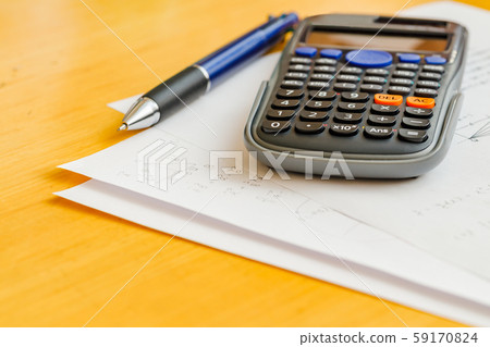 Math problems and pen and calculator Math problems and pen and calculator 59170824