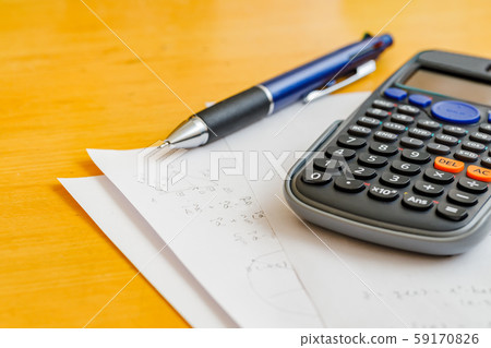 Math problems and pen and calculator Math problems and pen and calculator 59170826