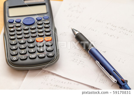 Math problems and pen and calculator 59170831