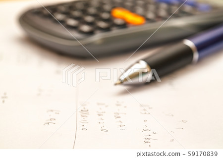 Math problems and pen and calculator 59170839