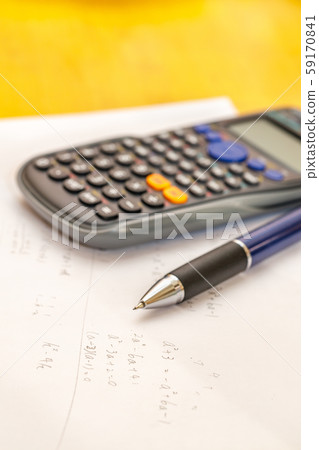Math problems and pen and calculator Math problems and pen and calculator 59170841