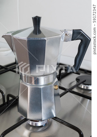 Brewing coffee in moka pot, concept of morning 59172347
