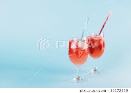 Fresh strawberry summer cocktail and ice cubes. Fresh strawberry summer cocktail and ice cubes. 59172359