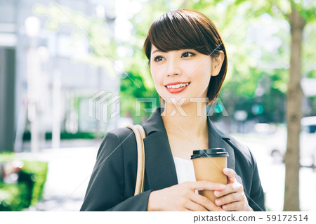 Business woman takeaway coffee 59172514