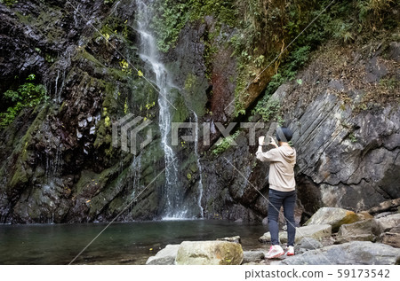 woman take a picture woman take a picture 59173542